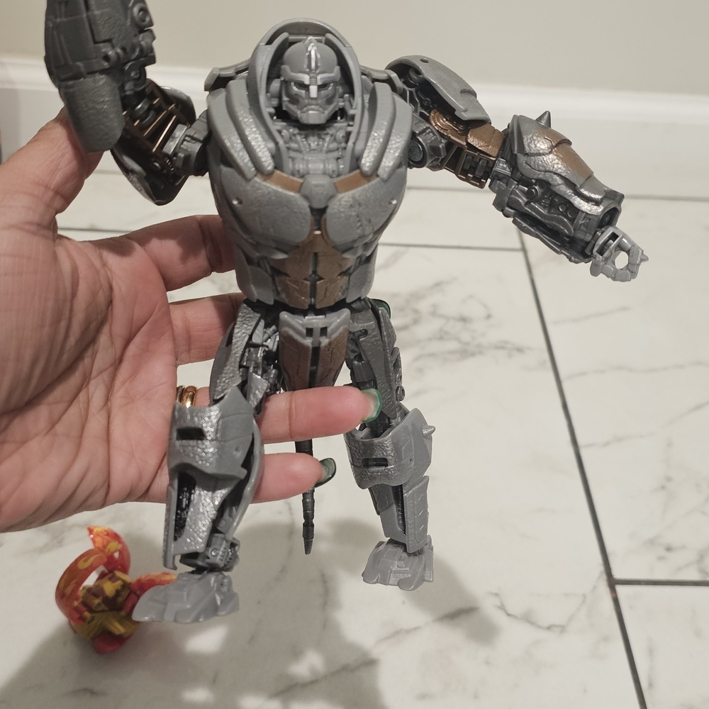 Transformer Figure. Gray and Bronze Action Figure